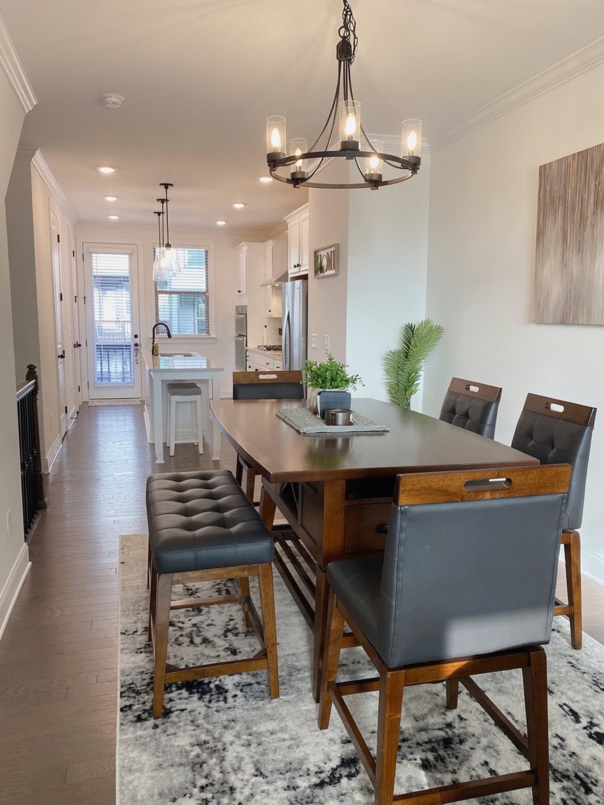 Beautifully staged open dining room and kitchen